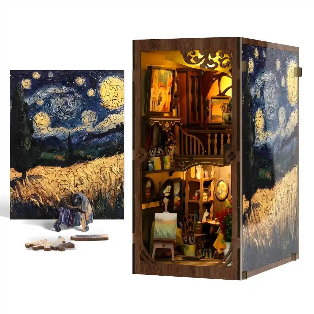 The Hands Craft DIY Book Nook Kit: Golden Twilight Studio is a Van Gogh-inspired artist’s loft diorama with scattered puzzle pieces, housed in a wooden box and designed to transform your shelf into an enchanting miniature studio.