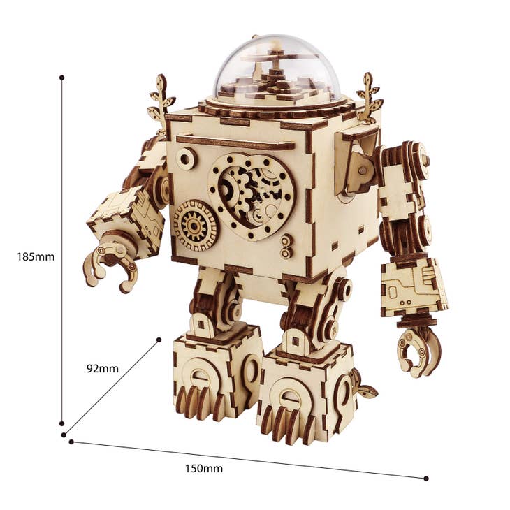 The DIY 3D Steam Punk Music Box: Orpheus by Hands Craft is designed with intricate gears and a clear dome on top. Standing on square feet with detailed joints, this wooden puzzle measures 185mm in height, 92mm in depth, and 150mm in width.