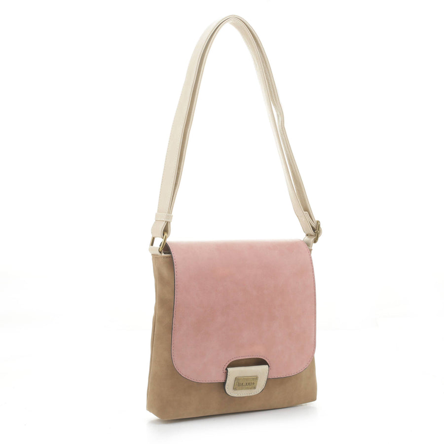 The Amy Crossbody - Coral by Liz Soto Handbags is a vegan leather shoulder bag featuring a light brown body, pale pink flap, beige adjustable strap, and rectangular metal clasp—ideal for modern crossbody style.