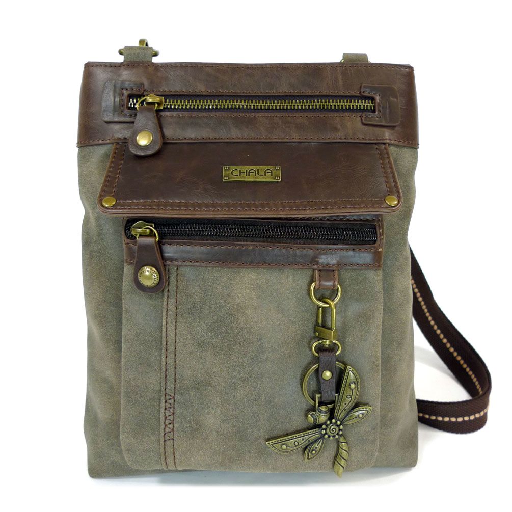 Introducing the Gemini Xbody w DF Stone by Chala—a chic crossbody bag that highlights a brown faux leather flap, adorned with two front zippers and a charming brass dragonfly. This stylish accessory is completed with a strap featuring intricate stitching, the signature "Chala" logo badge at the top, and a detachable front pocket for added versatility.