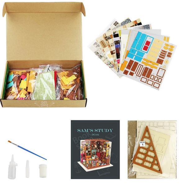 The Hands Craft Sam’s Study Room DIY Miniature Kit includes an open box with materials, tools, paint, glue, wooden 3D puzzle pieces, printed instructions, and a cover image of the completed mini book nook.