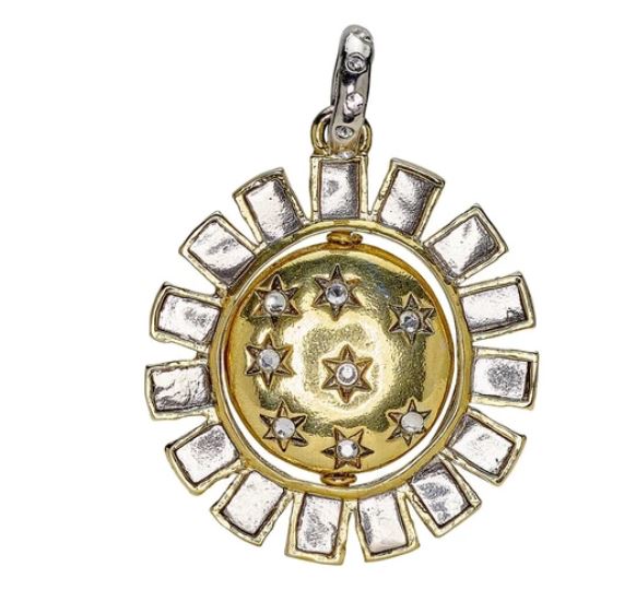 The Waxing Poetic Made of Stars Spinner Pendant features a round brass sun with a gold center, star accents, a gemstone, and silver rays, all hanging elegantly on a sterling silver necklace for unique crystal jewelry charm.