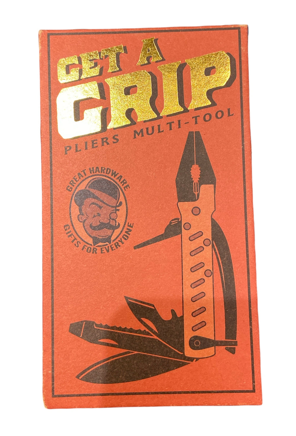 A red LuckyJack box with gold "GET A GRIP" text. Below is an illustration of the Get a Grip Multi Pliers, featuring wire cutters, knife, and screwdriver. The box reads "PLIER MULTI-TOOL" and "GREAT HARDWARE GIFTS FOR EVERYONE.