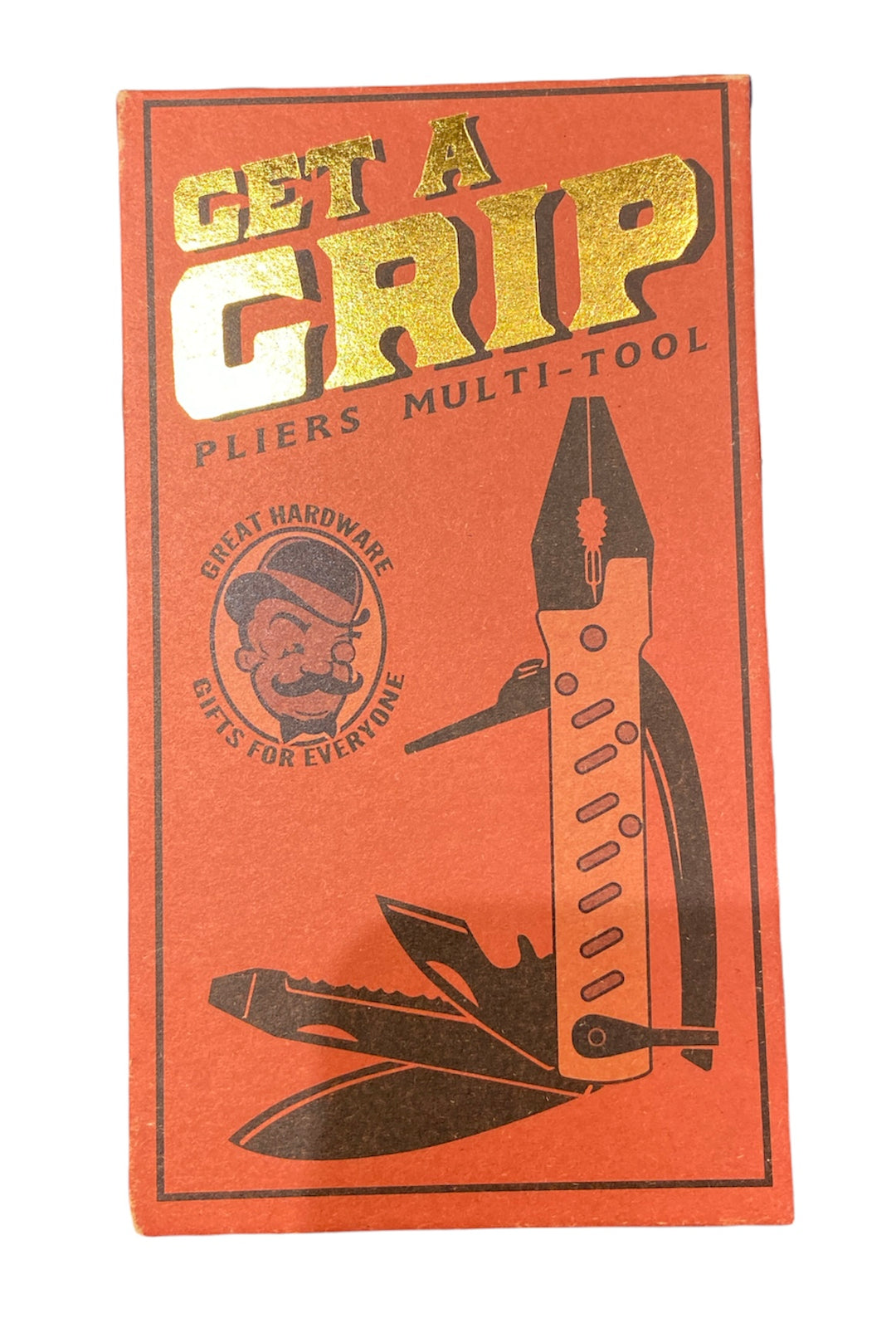 A red LuckyJack box with gold "GET A GRIP" text. Below is an illustration of the Get a Grip Multi Pliers, featuring wire cutters, knife, and screwdriver. The box reads "PLIER MULTI-TOOL" and "GREAT HARDWARE GIFTS FOR EVERYONE.