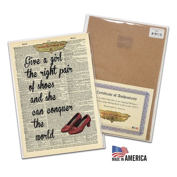 The "Pair of shoes can conquer" art print by VintageDictionary features red shoes and the quote, "Give a girl the right pair of shoes and she can conquer the world," plus certificate of authenticity and Made in America label.