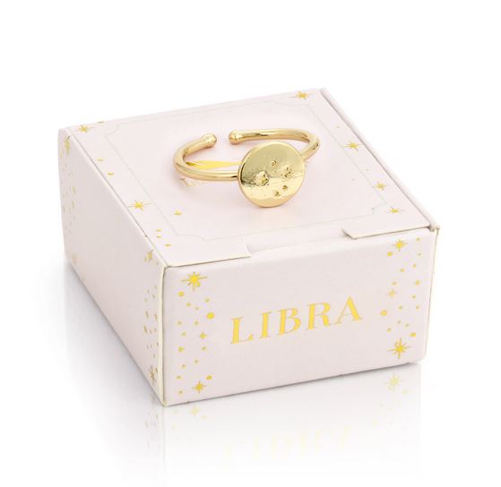 The LuckyFeather Libra Signet Ring, a 14k gold-dipped piece with an adjustable band, features a round engraved plate and comes in a white box adorned with gold stars and "LIBRA" in gold lettering.