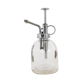 The CreativeCoOp Glass Plant Mister combines a vintage design with functionality, featuring a transparent glass body and metal nozzle, complemented by a silver ring for easy handling—perfect for watering small indoor plants.
