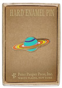 The Saturn Pin, a hard enamel pin depicting a planet with multicolored rings, is displayed in a gift box labeled "Hard Enamel Pin" and "PeterPauperP, White Plains, New York." It measures 2-3/8 inches wide by 3-1/4 inches high.
